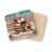 Coaster with stack of books, flowers, feathers, and text "Wild At Heart".