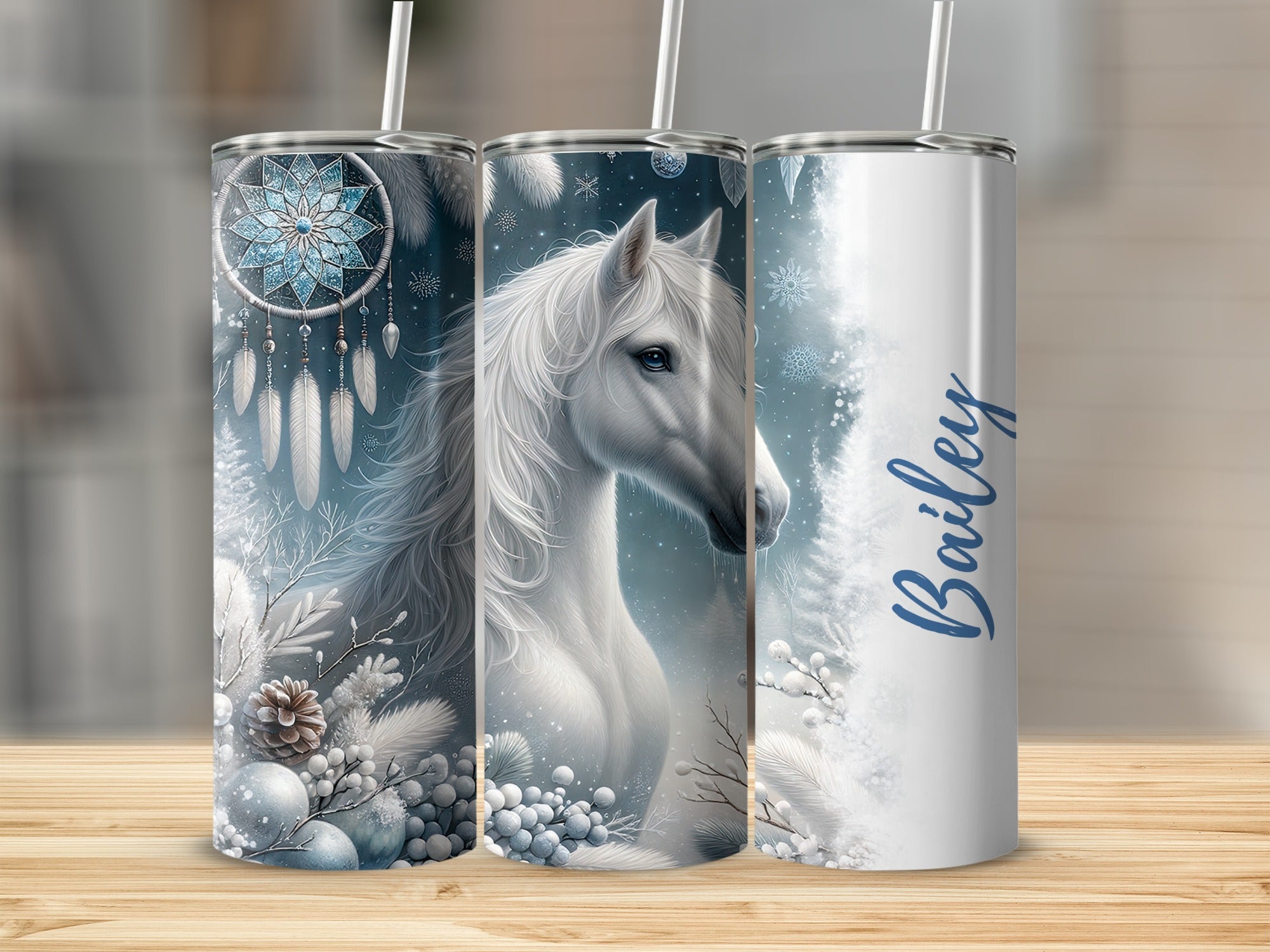 White horse and dreamcatcher design on three tumblers, one with "Bailey" text.
