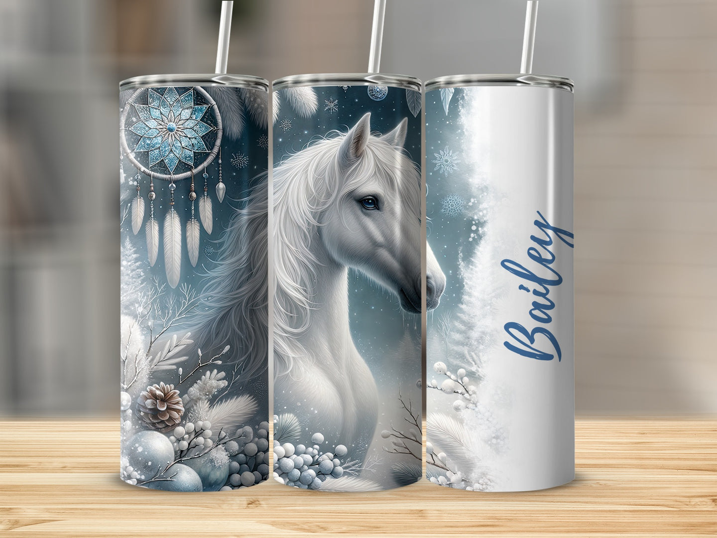 White horse and dreamcatcher design on three tumblers, one with "Bailey" text.