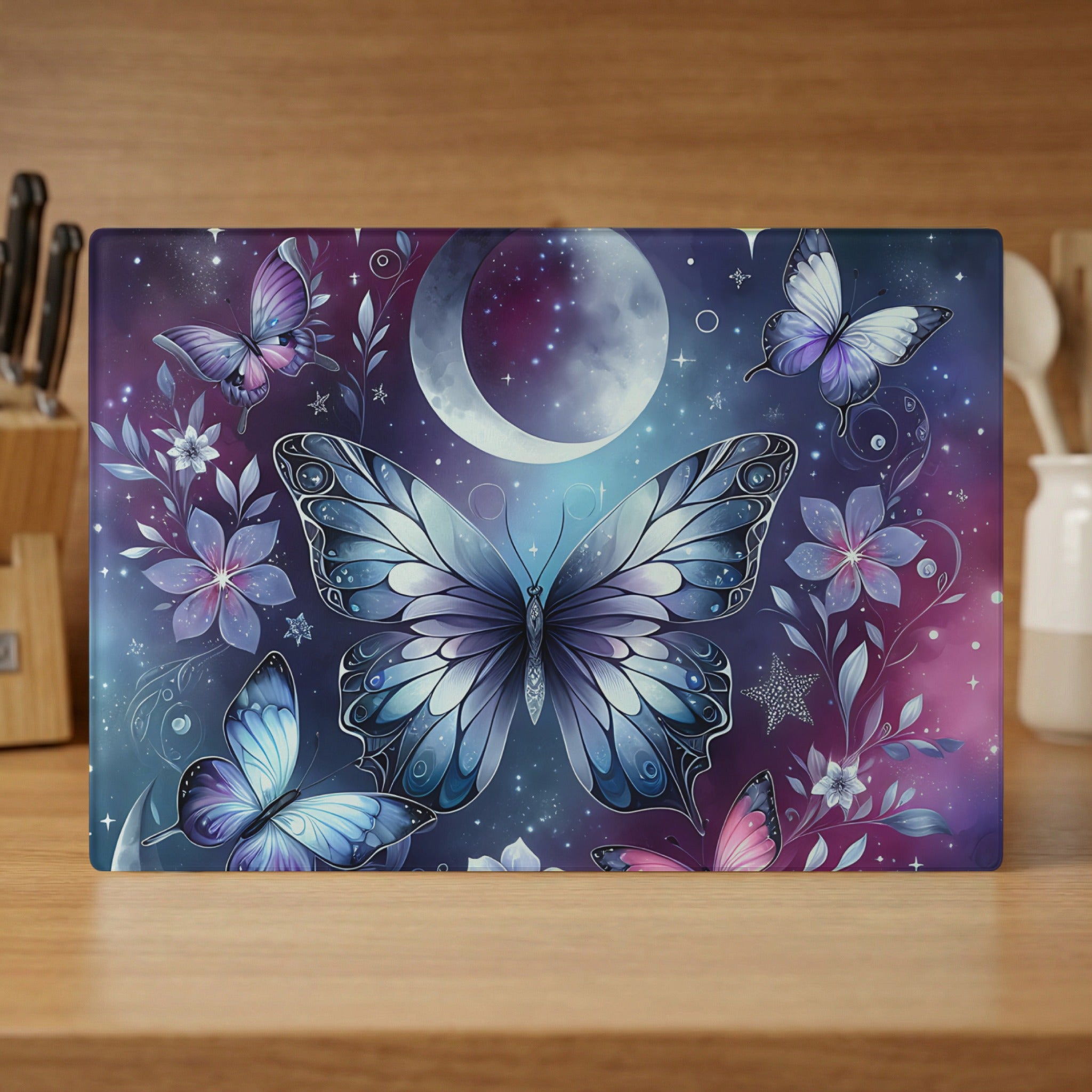 Two large blue butterflies and smaller ones surrounded by flowers and a crescent moon.