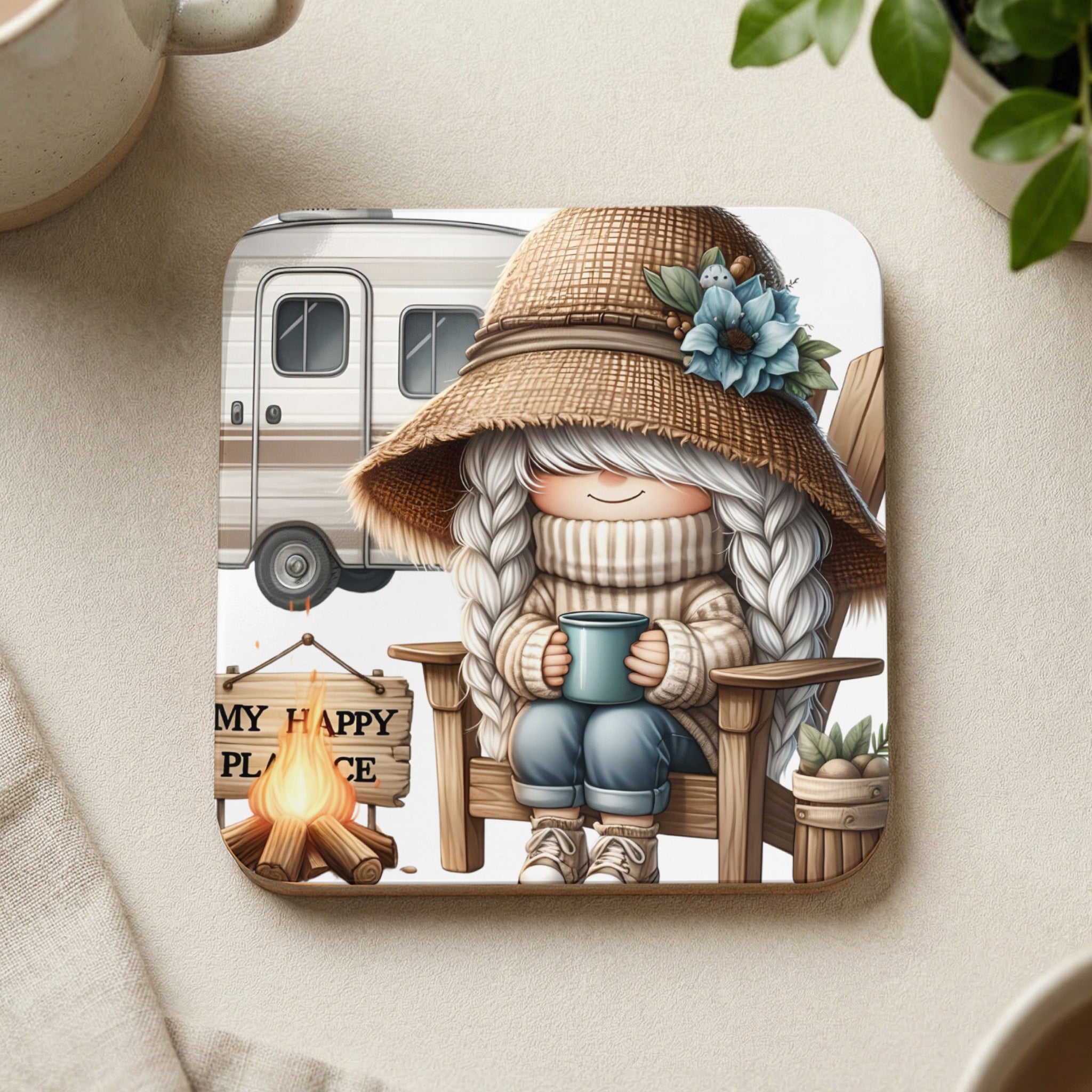 Coaster featuring a cartoon camper, campfire, and person in a hat holding a mug.