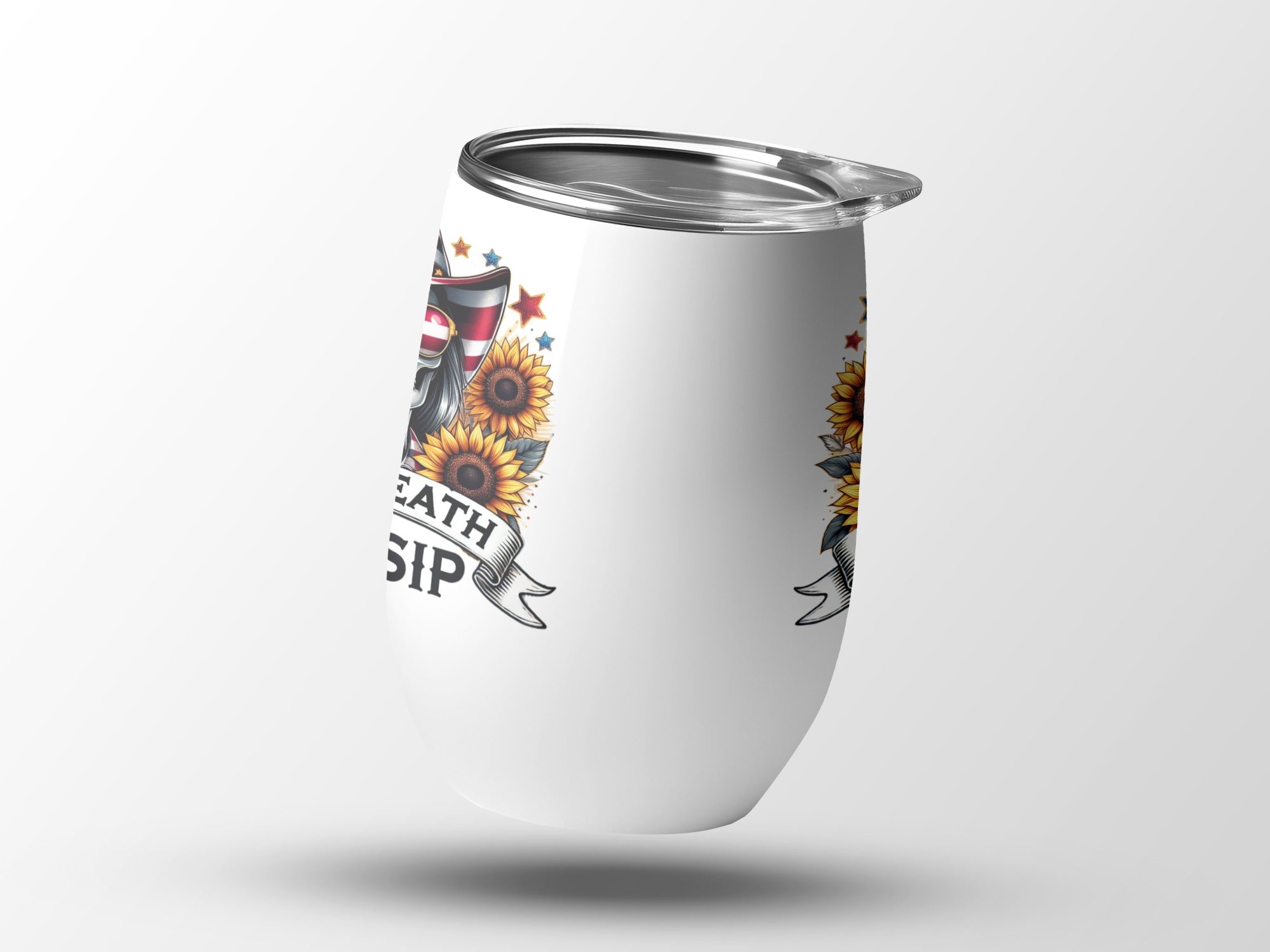 White tumbler with patriotic skulls and sunflowers, "DEATH BEFORE SIP" text.