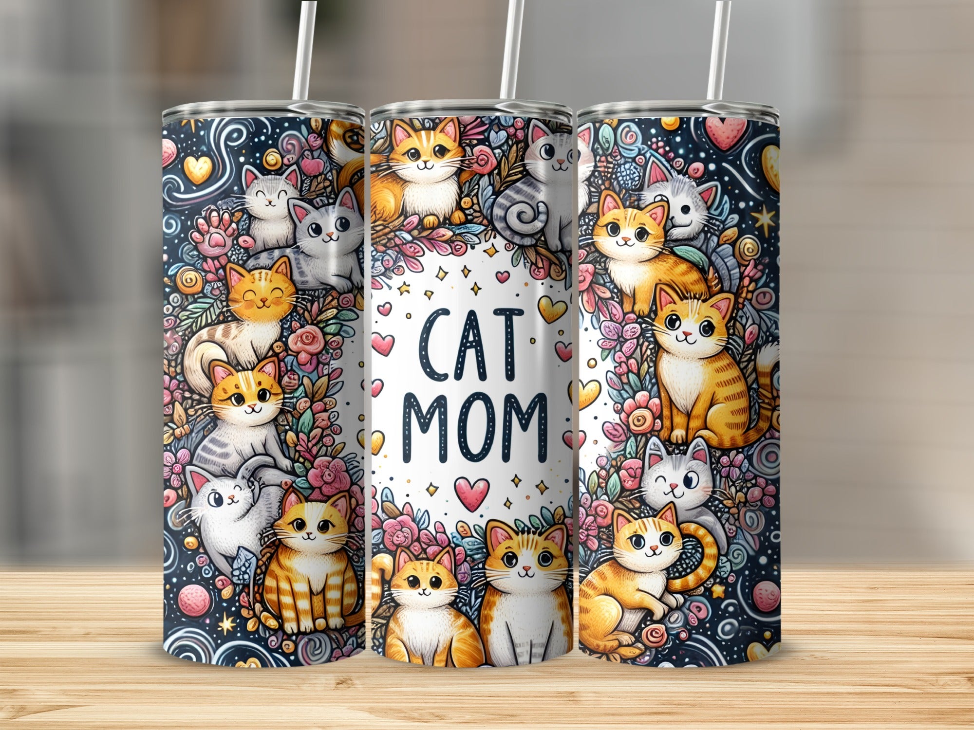 Tumbler with "Cat Mom" text and colorful illustrations of cats and flowers.