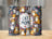 Tumbler with "Cat Mom" text and colorful illustrations of cats and flowers.