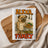 Sad pug wearing apron with text "ALEXA, FEED THIS FAMILY".