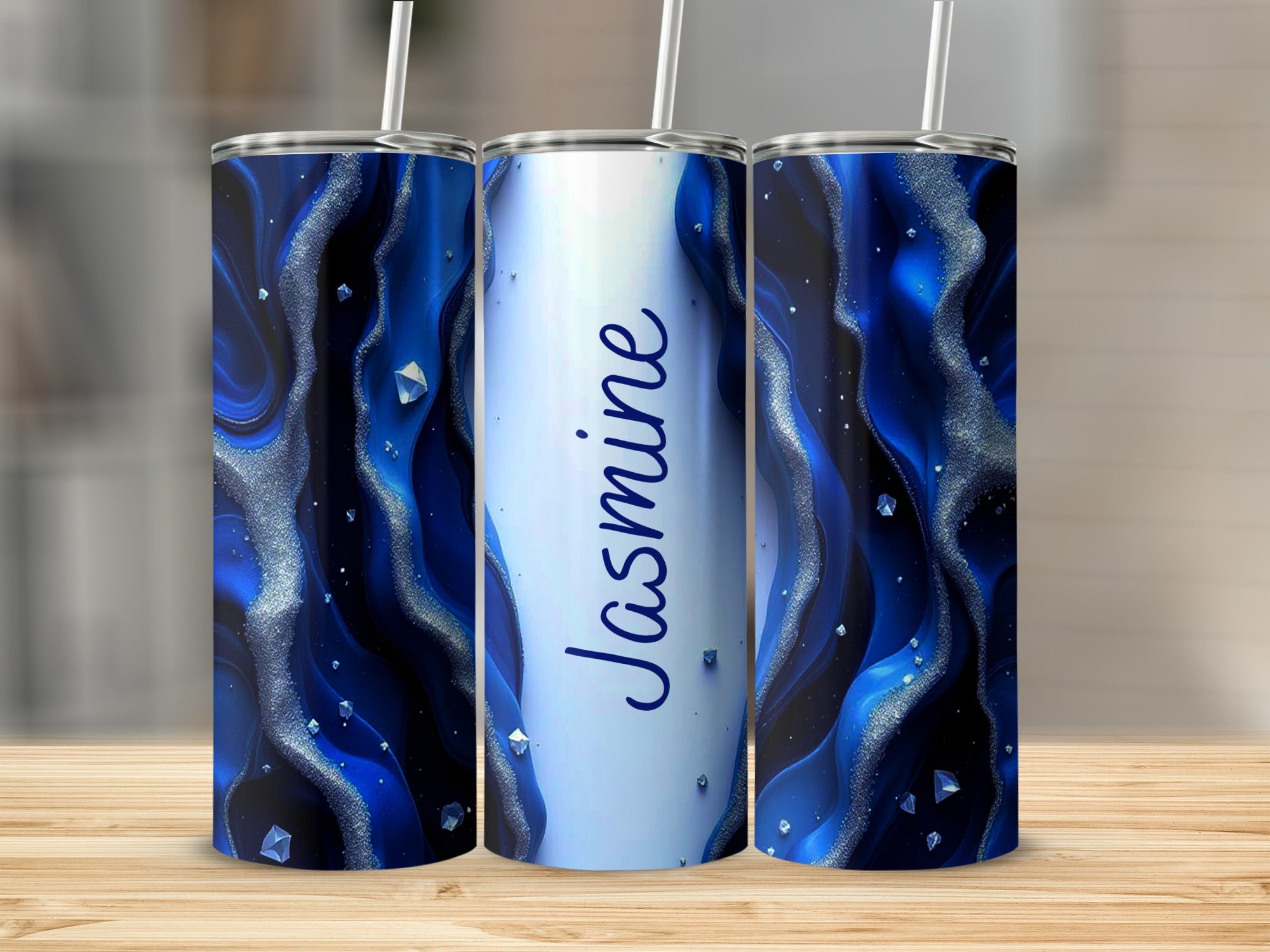 Blue marble design tumbler with "Jasmine" text.