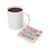 White mug and coaster with text "You Are Enough" and heart designs.