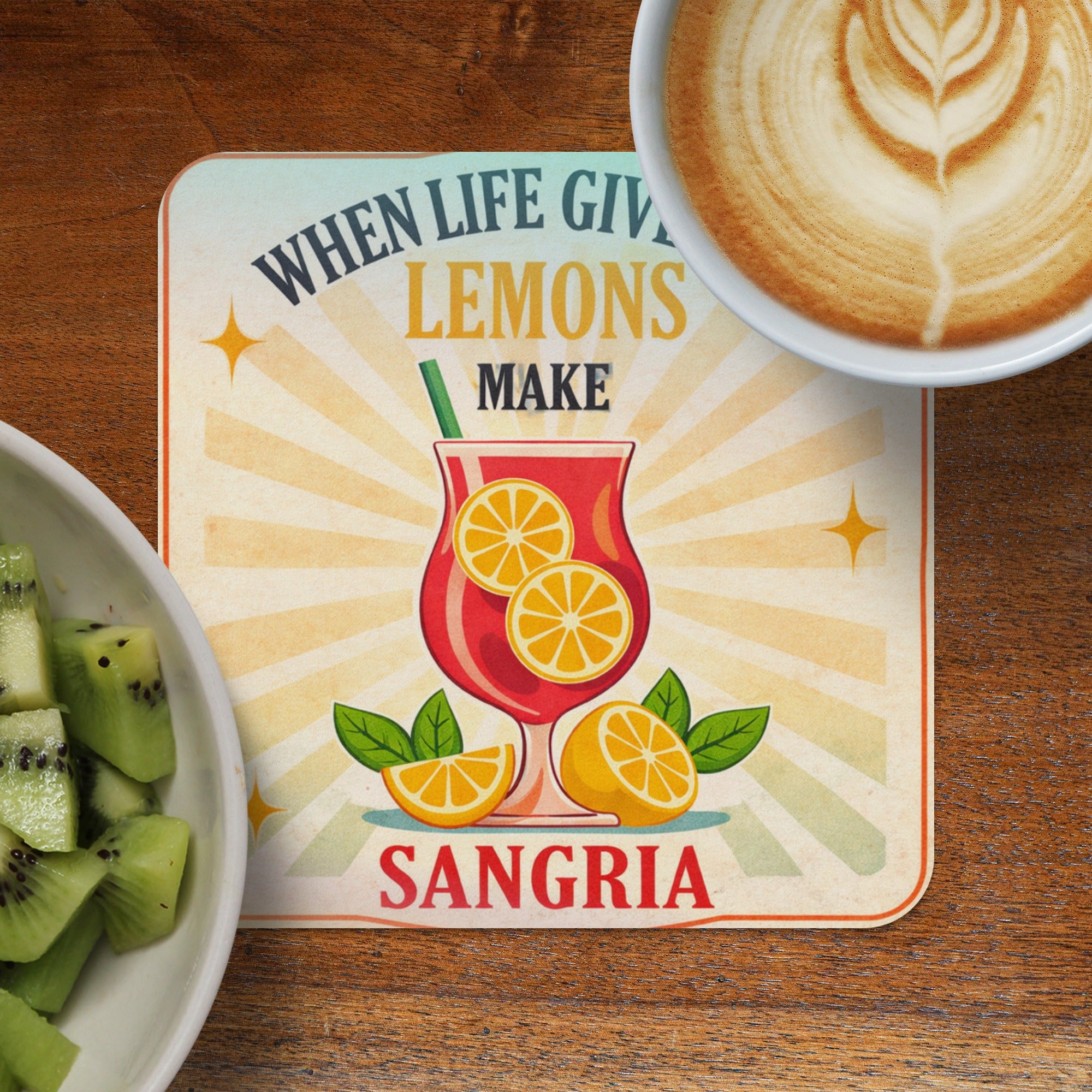 Coaster with "When life gives you lemons make sangria" text and a cocktail illustration.