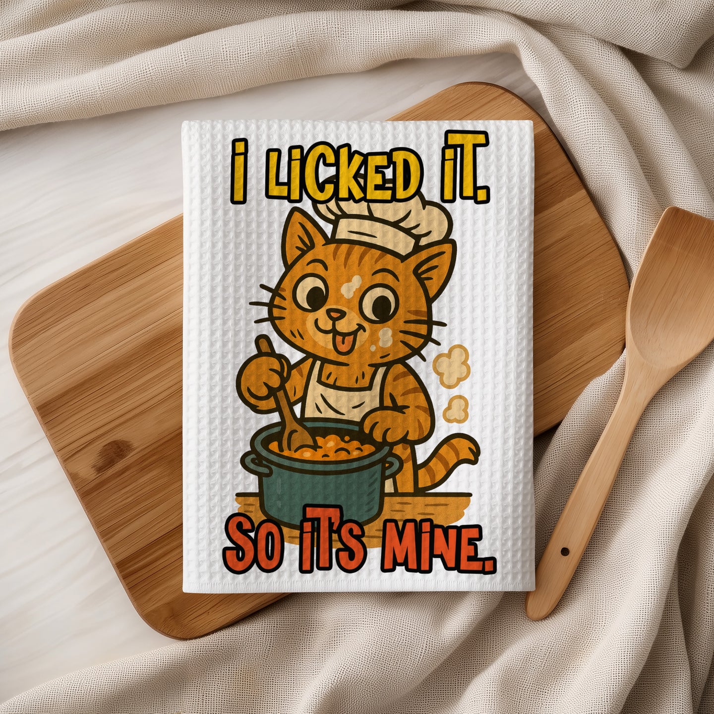 Cartoon cat in chef hat cooking in pot with text "I LICKED IT. SO IT'S MINE."