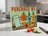 Glass cutting board with cartoon vegetables and "PURCHASE ME" text.
