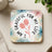"I AM GRATEFUL FOR MY LIFE" text surrounds pink tulips on a coaster.