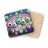 Bingo cards and colorful bingo balls scattered on a textured surface.