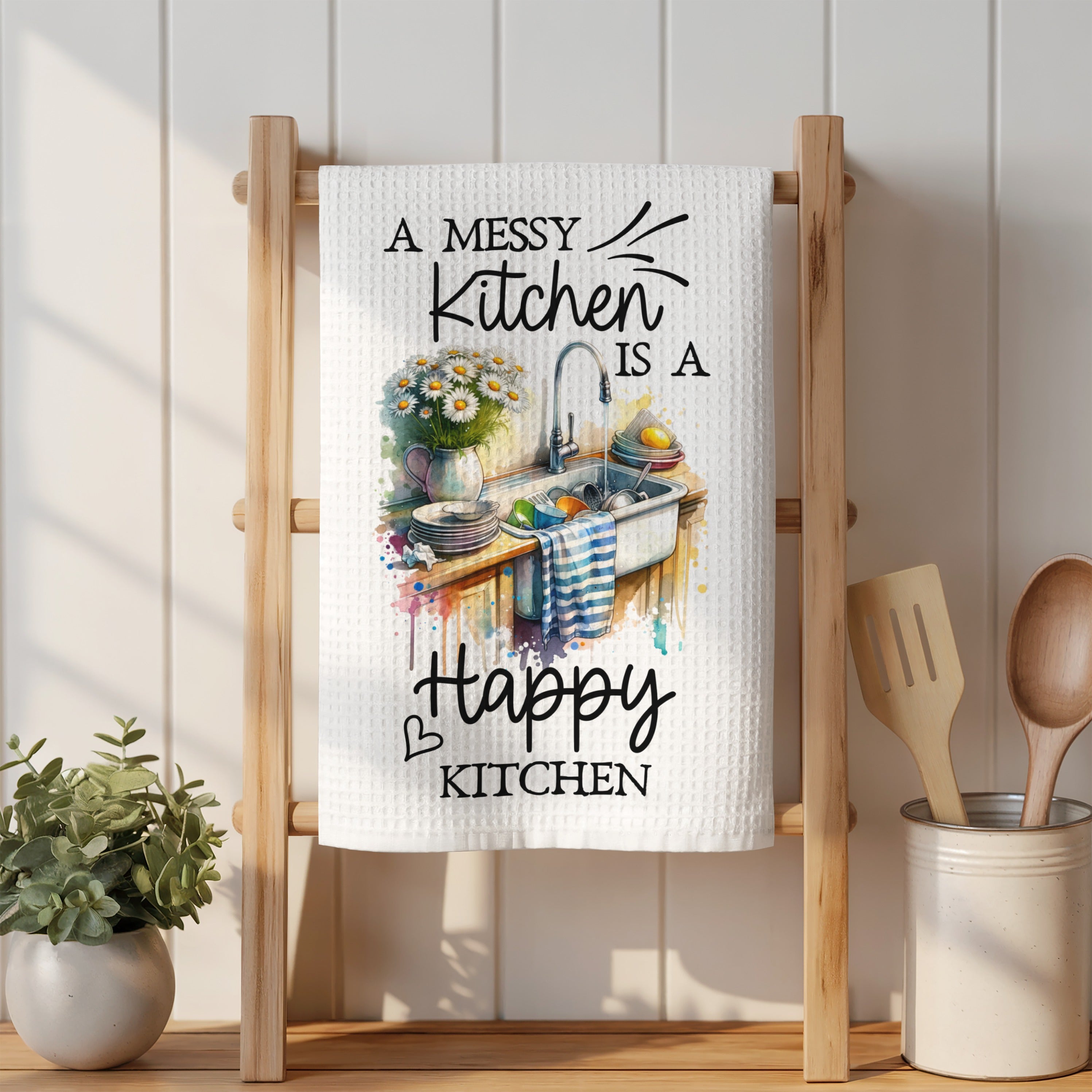 Waffle weave towel with watercolor art of a happy messy kitchen.