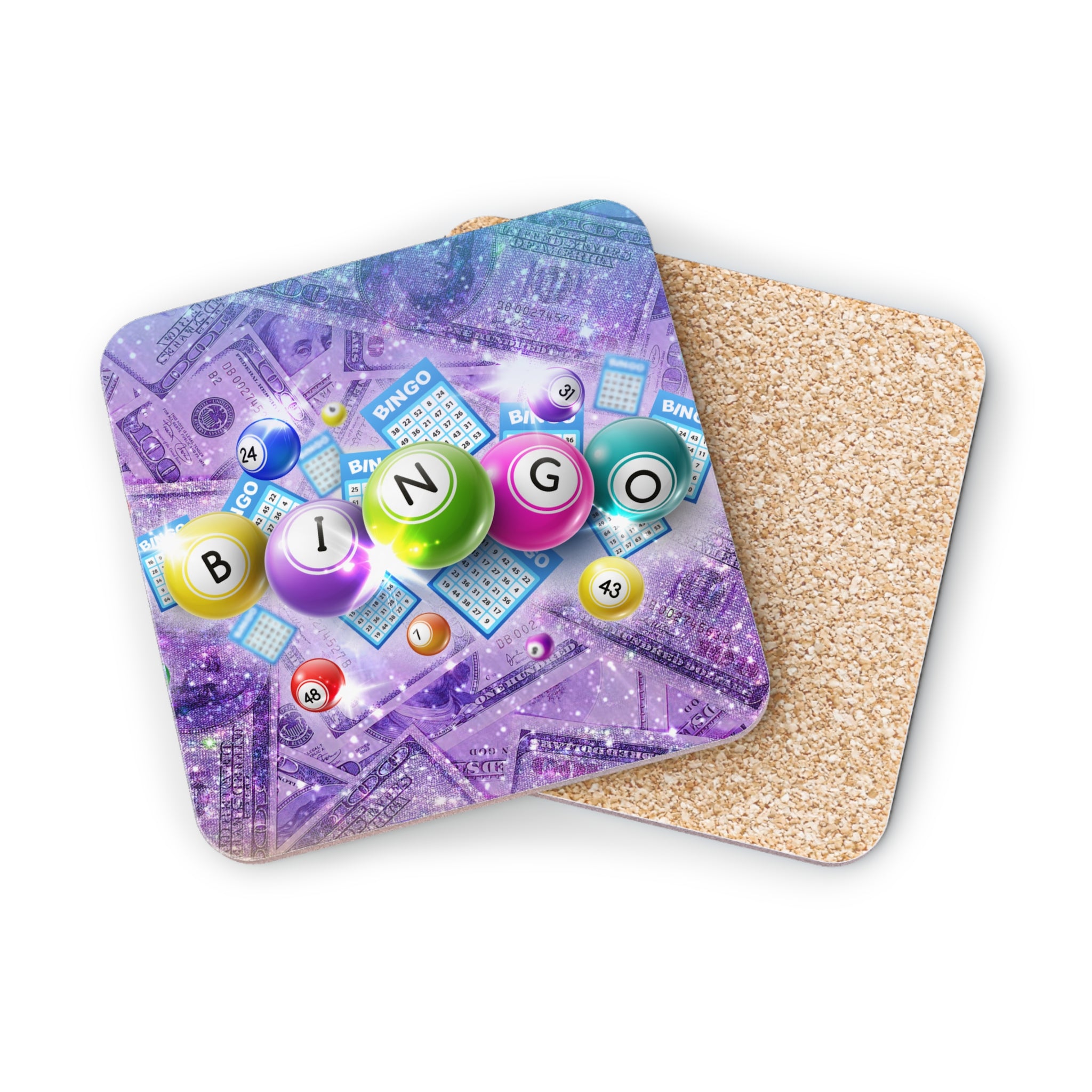 Bingo balls and cards with dollar bill pattern on a glitter coaster.