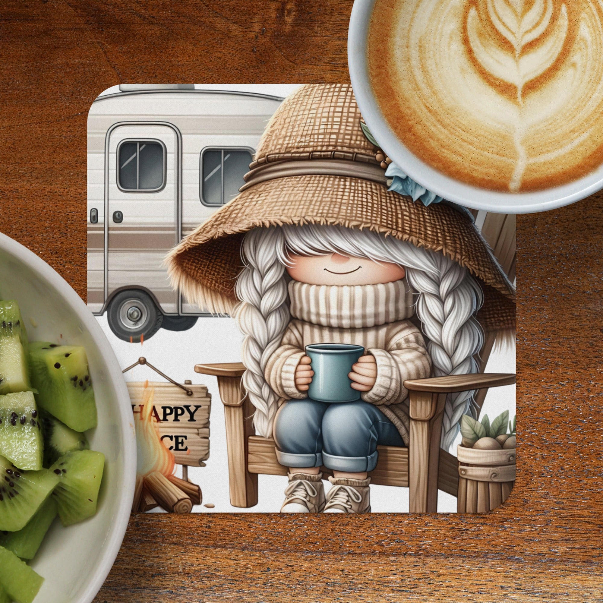Gnome in oversized hat sits on camping chair holding mug, near sliced kiwi and coffee.