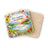 Square coaster with floral border, lake scene, and Bible verse "Love is patient, love is kind."