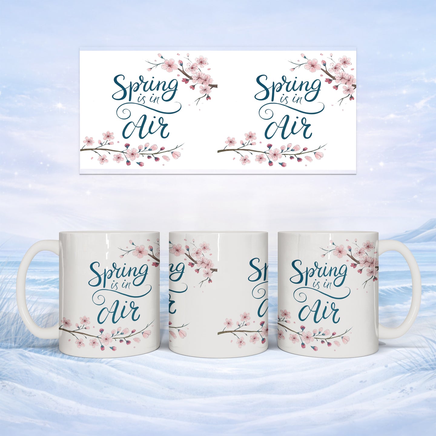 White mug with "Spring is in Air" text and cherry blossoms.
