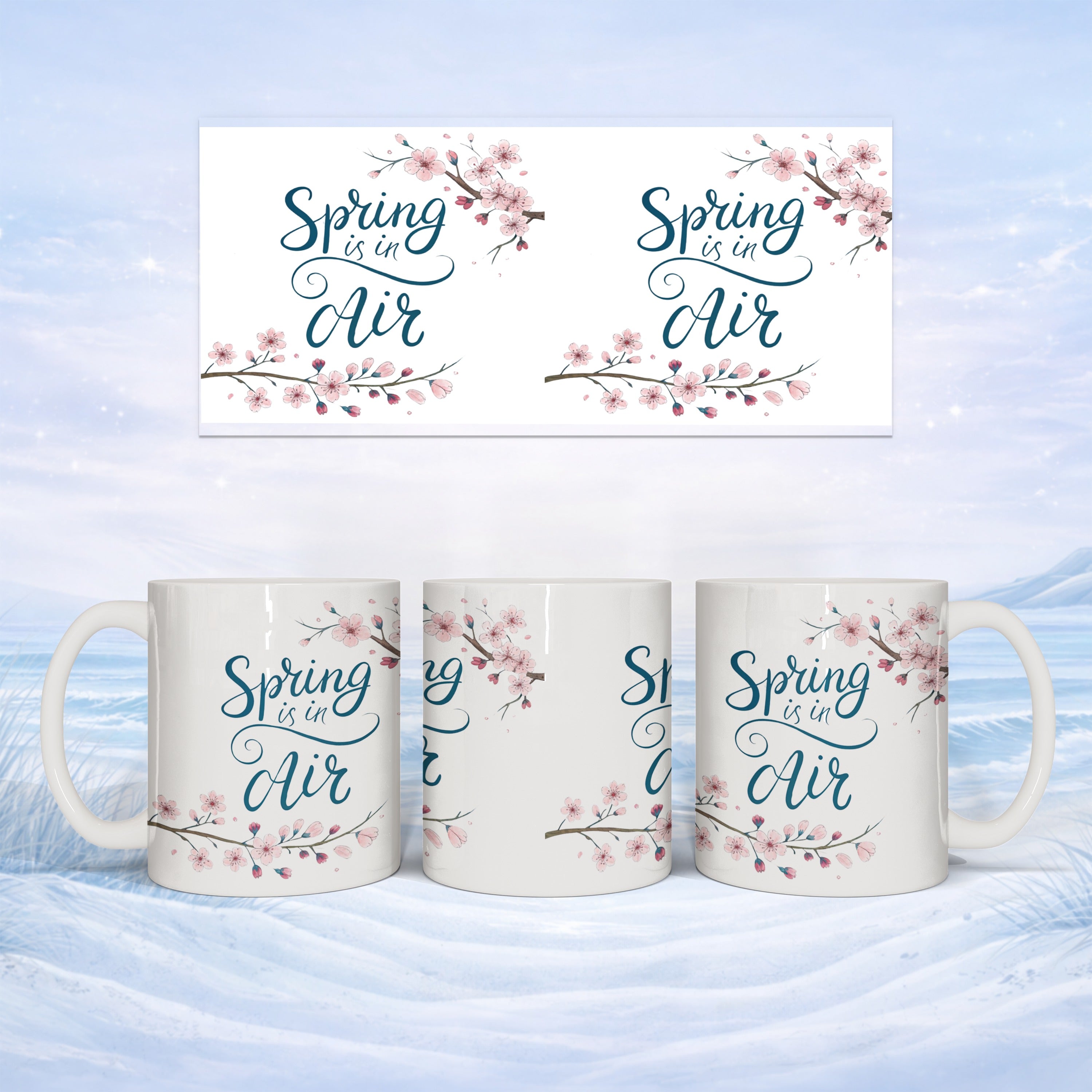 White mug with "Spring is in Air" text and cherry blossoms.