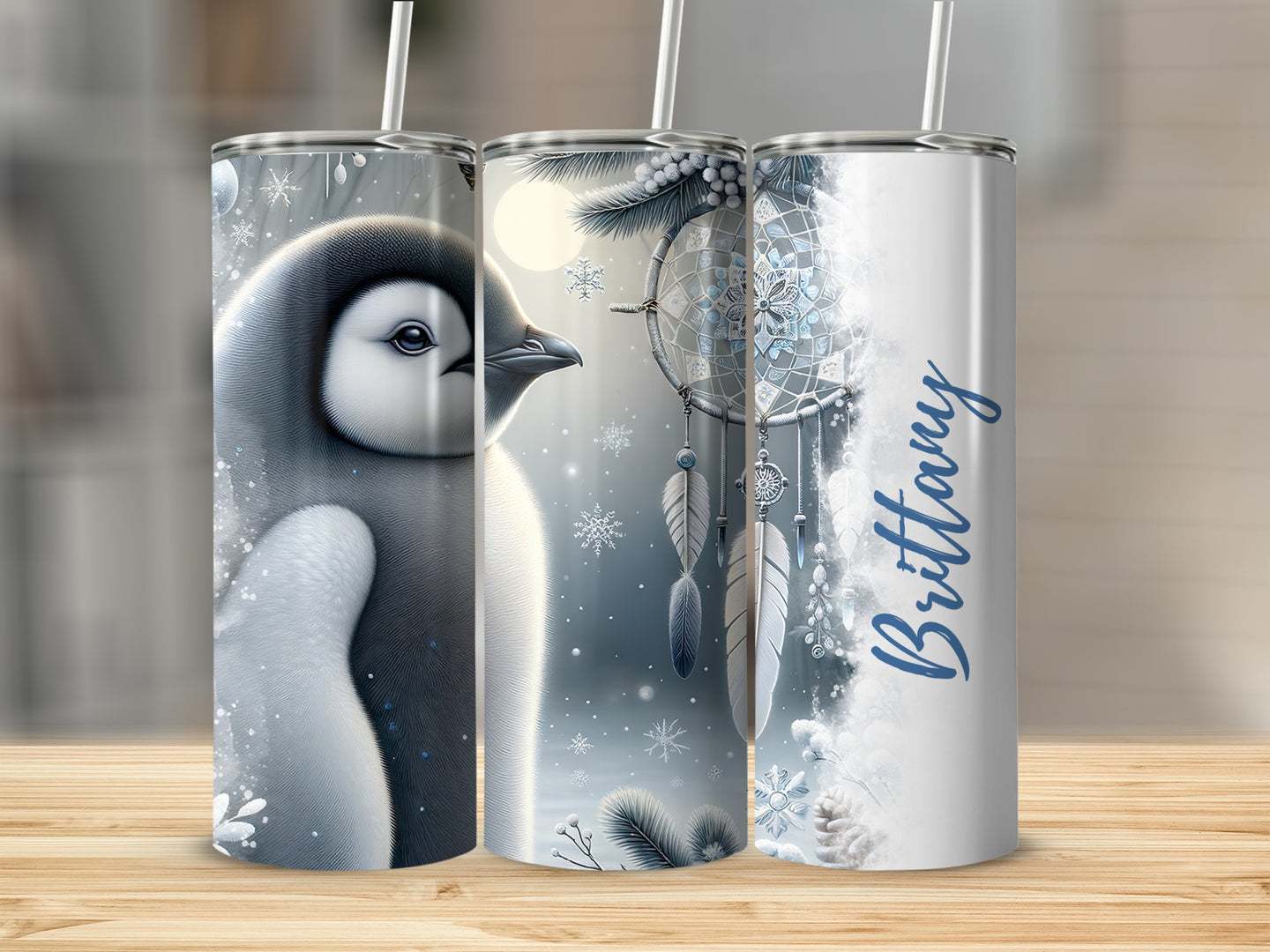 Penguin and dreamcatcher tumbler with "Brittany" text.
