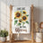 White kitchen towel with sunflowers and text "LIVE LIFE IN FULL BLOOM".