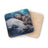 Woman sleeping on white buffalo with textured cork coaster.