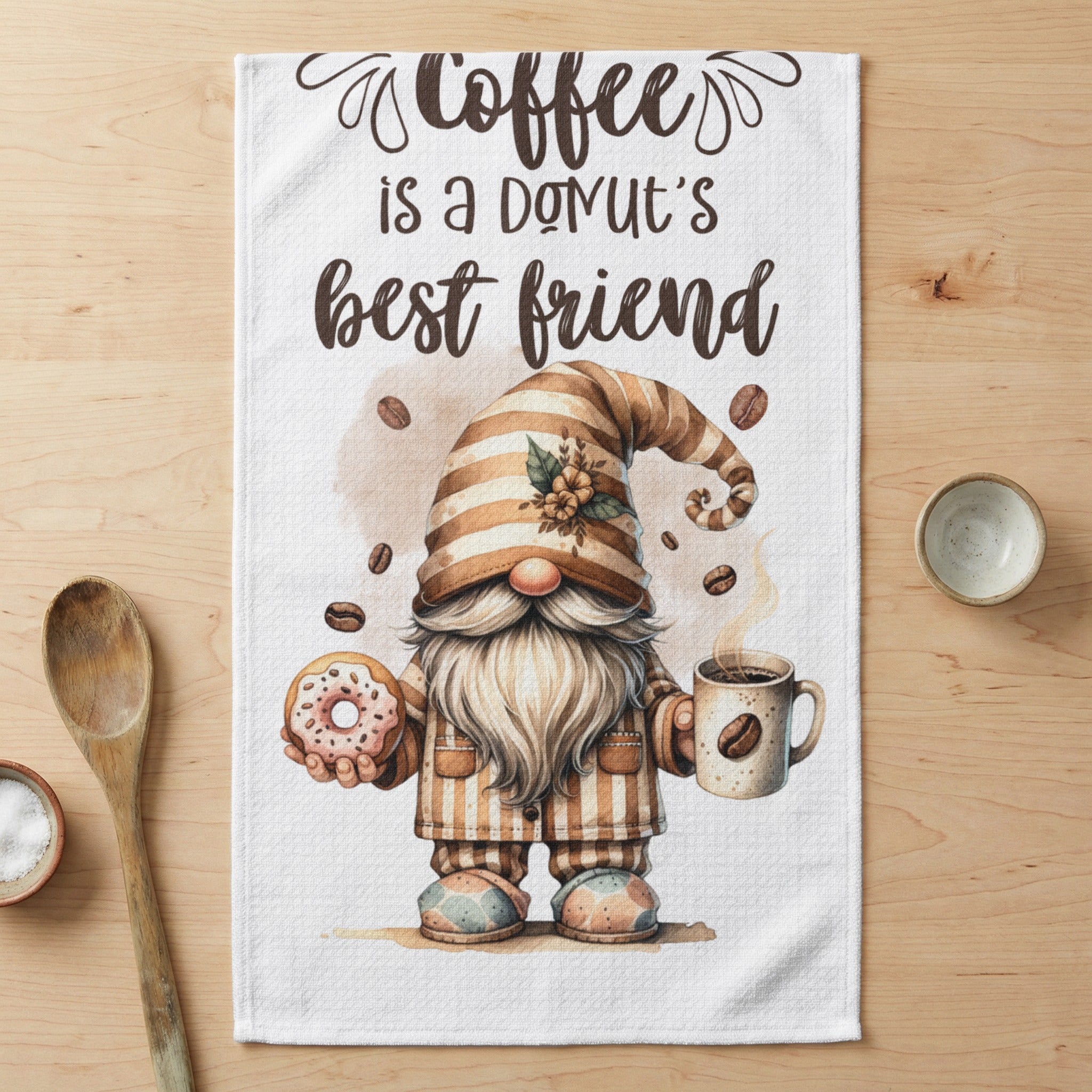 Gnome in striped pajamas holding coffee and donut, with text "Coffee is a donut's best friend".