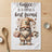 Gnome in striped pajamas holding coffee and donut, with text "Coffee is a donut's best friend".
