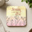 Square coaster with "Jesus is the light" text and floral illustration.