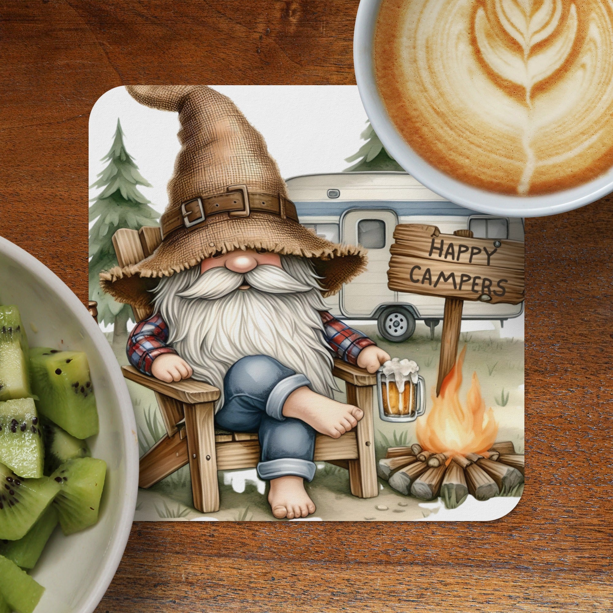 Gnome in a hat and plaid shirt sits by a campfire with a camper and "Happy Campers" sign.