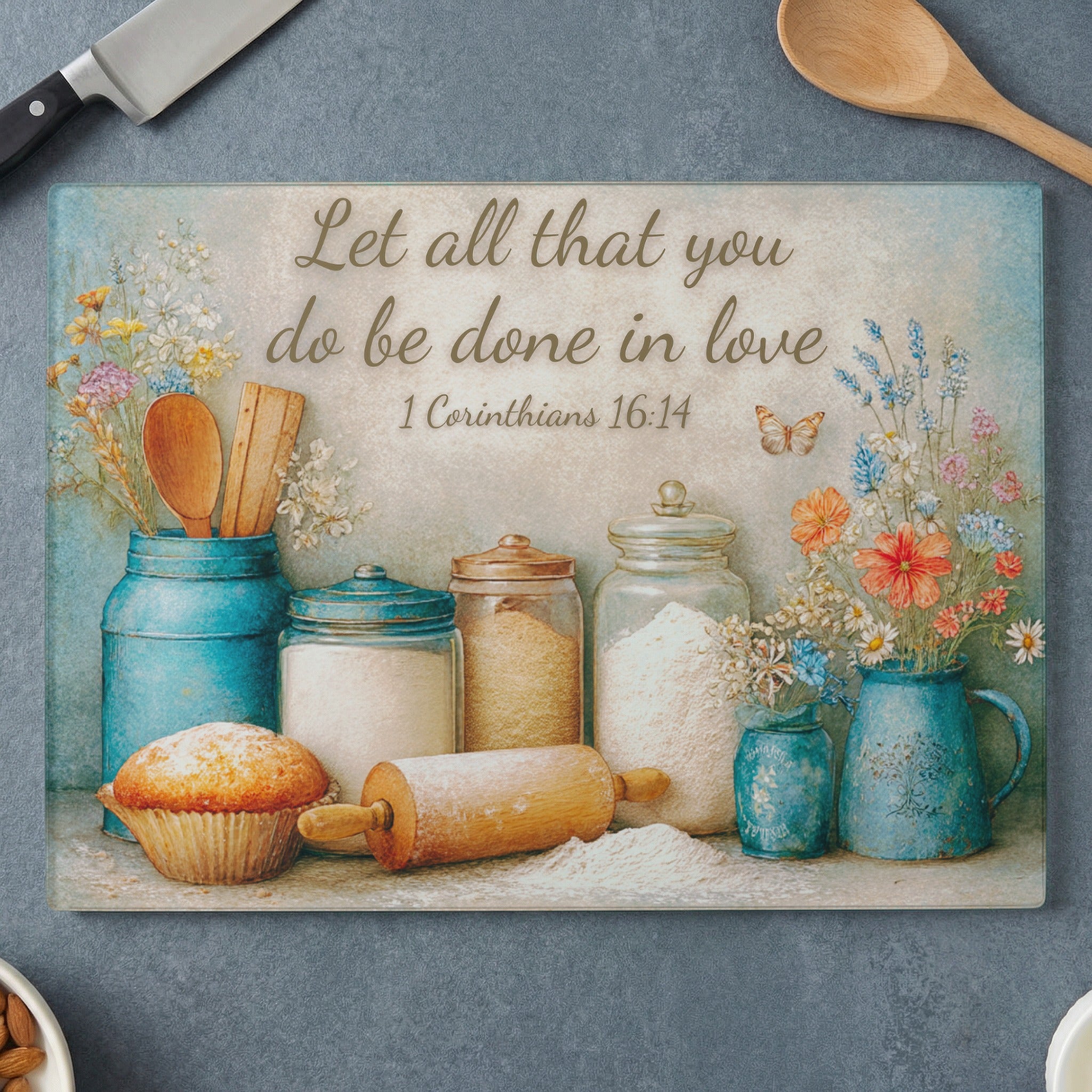Cutting board with "Let all that you do be done in love" text and baking ingredients.