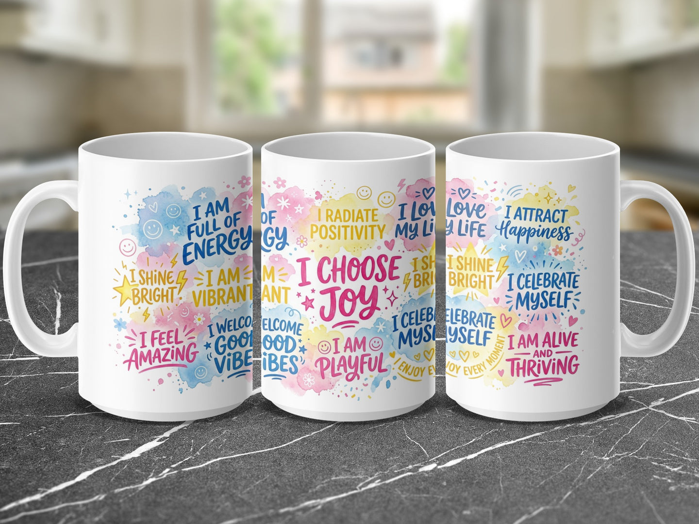 Three mugs with colorful affirmations and positive messages.