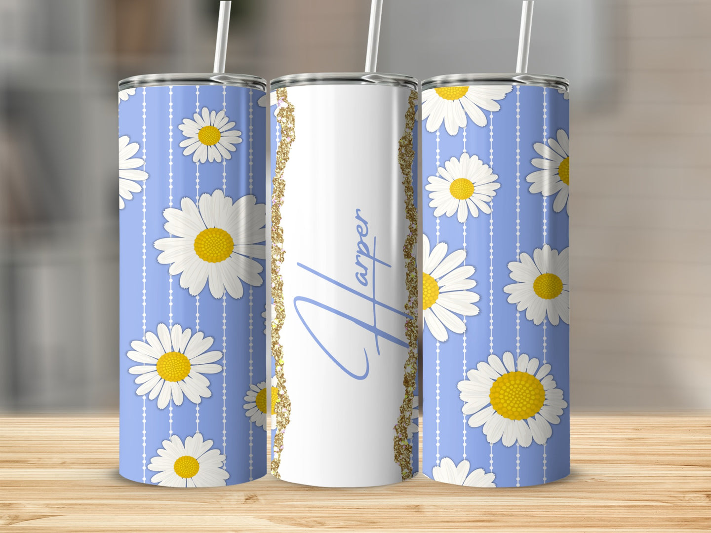 Personalized tumbler with white daisies on blue stripes and "Harper" text.