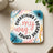 Coaster with pink text "Everything my way i deserve comes" on a floral background.