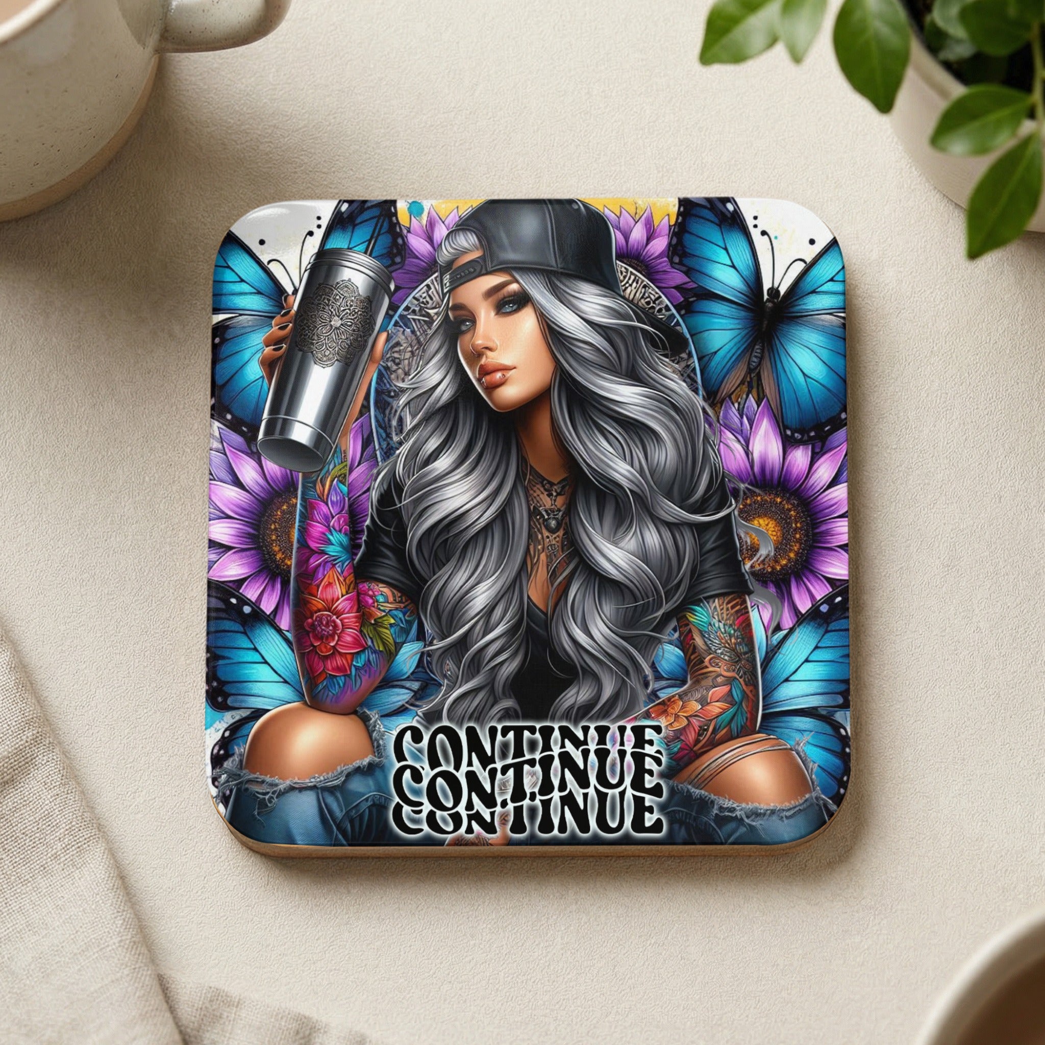 Tattooed woman with silver hair holding a cup, surrounded by butterflies and flowers.