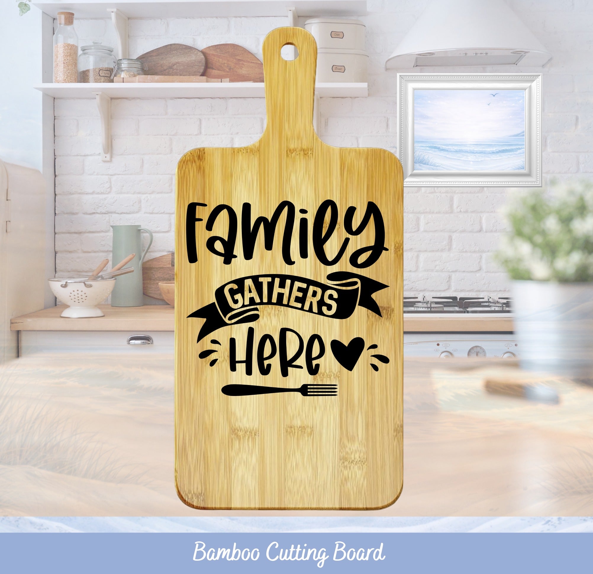 Bamboo cutting board with "Family Gathers Here" text and fork graphic.