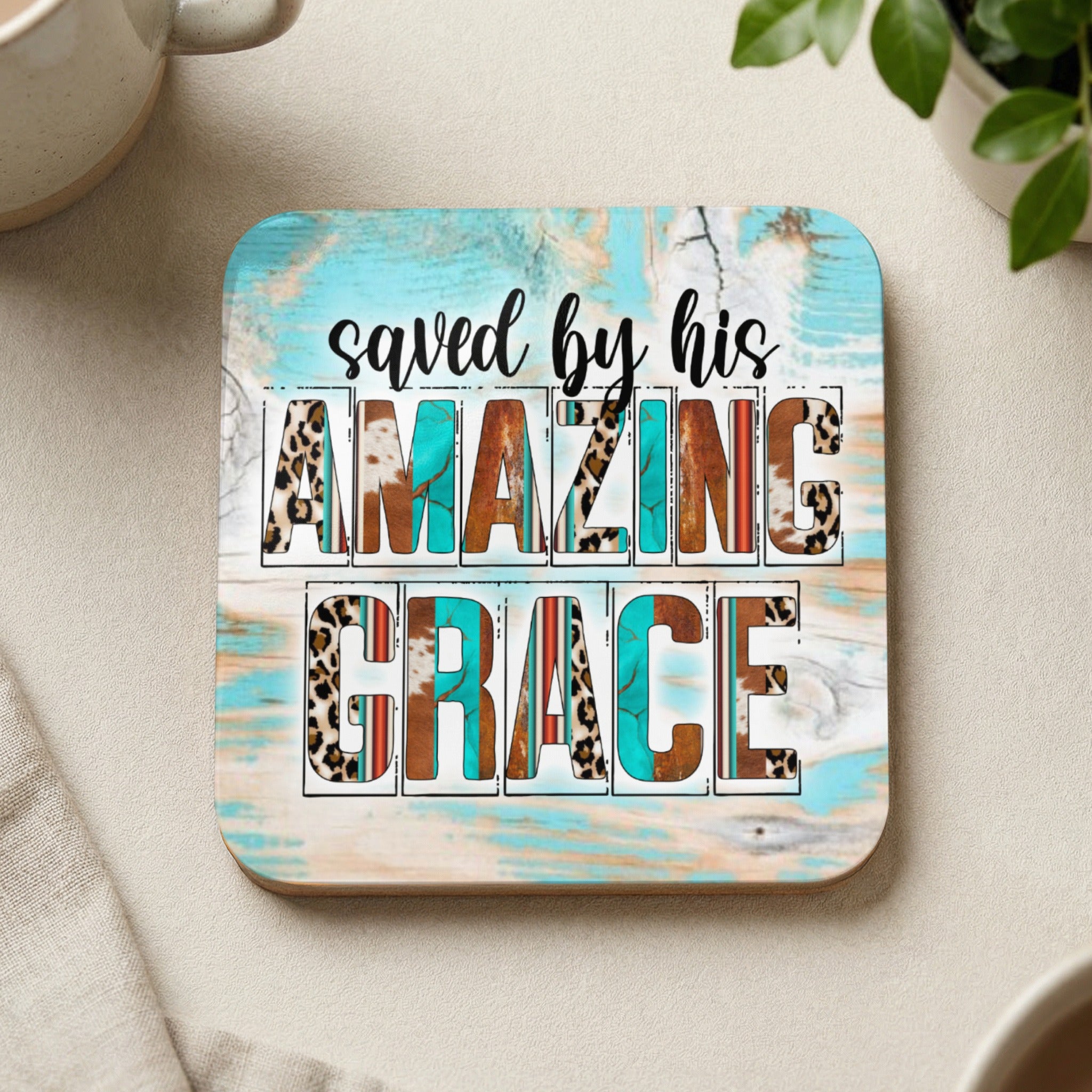 Coaster with "saved by his AMAZING GRACE" text and animal print accents.