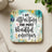 Coaster with text "I am attracting the most beautiful energies" and floral design.
