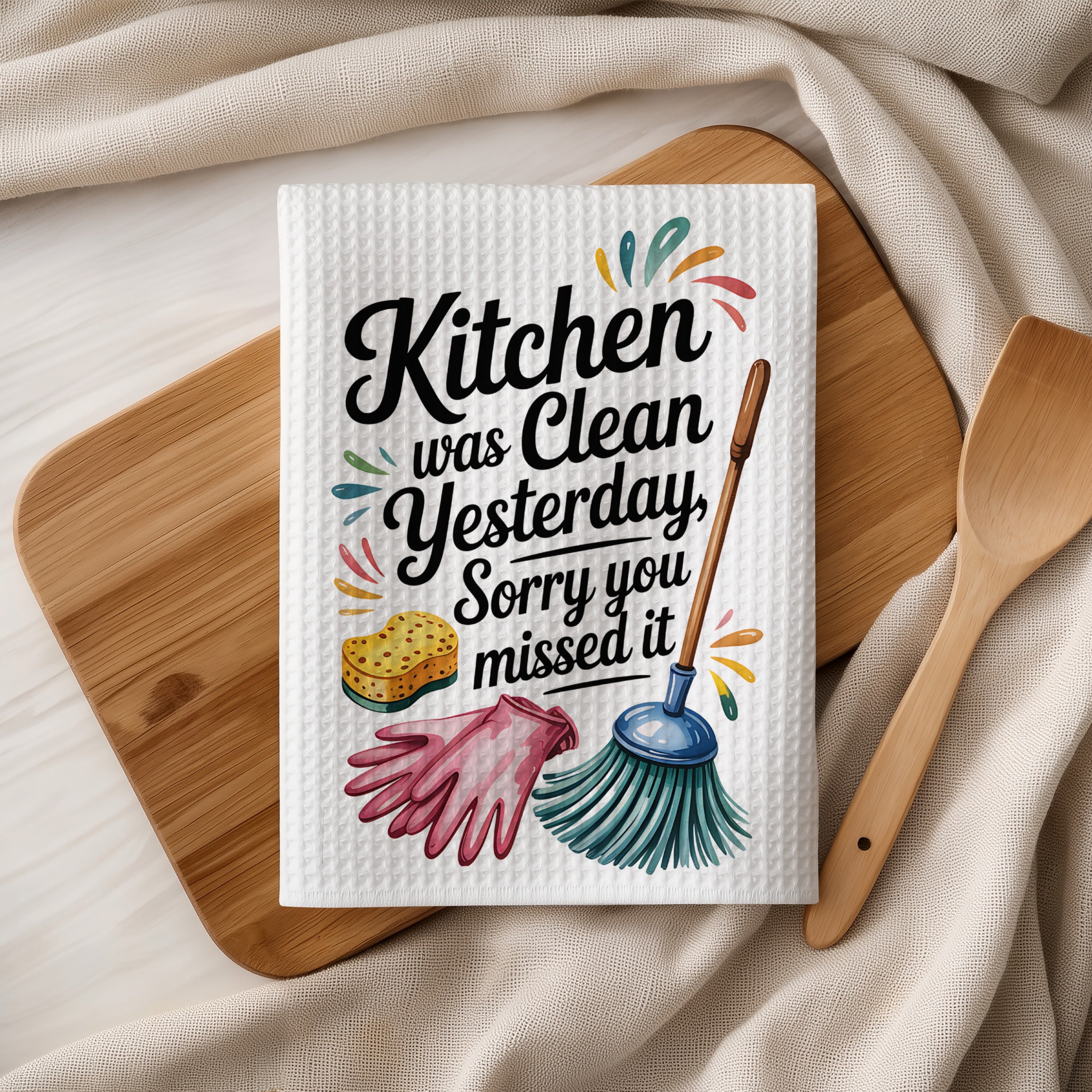 Kitchen towel with text "Kitchen was clean yesterday. Sorry you missed it."