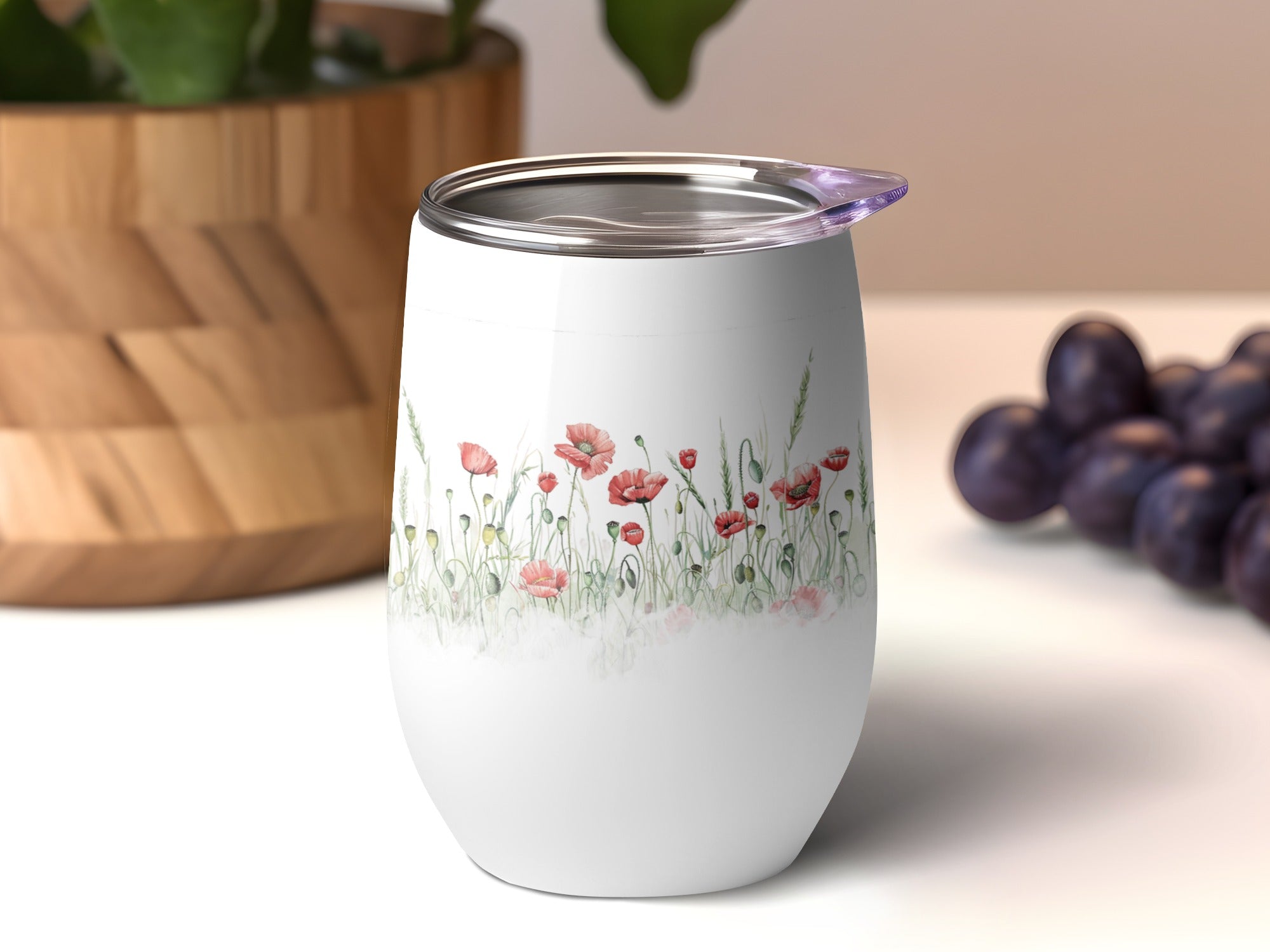 White stemless tumbler with a watercolor poppy floral design.