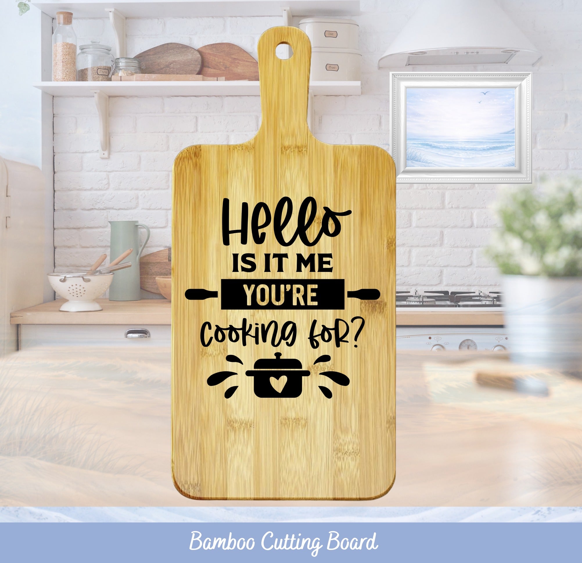 Bamboo cutting board with "Hello is it me you're cooking for?" text.