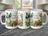 White mug with "Happy Birthday" text and butterflies, flowers, and leaves.