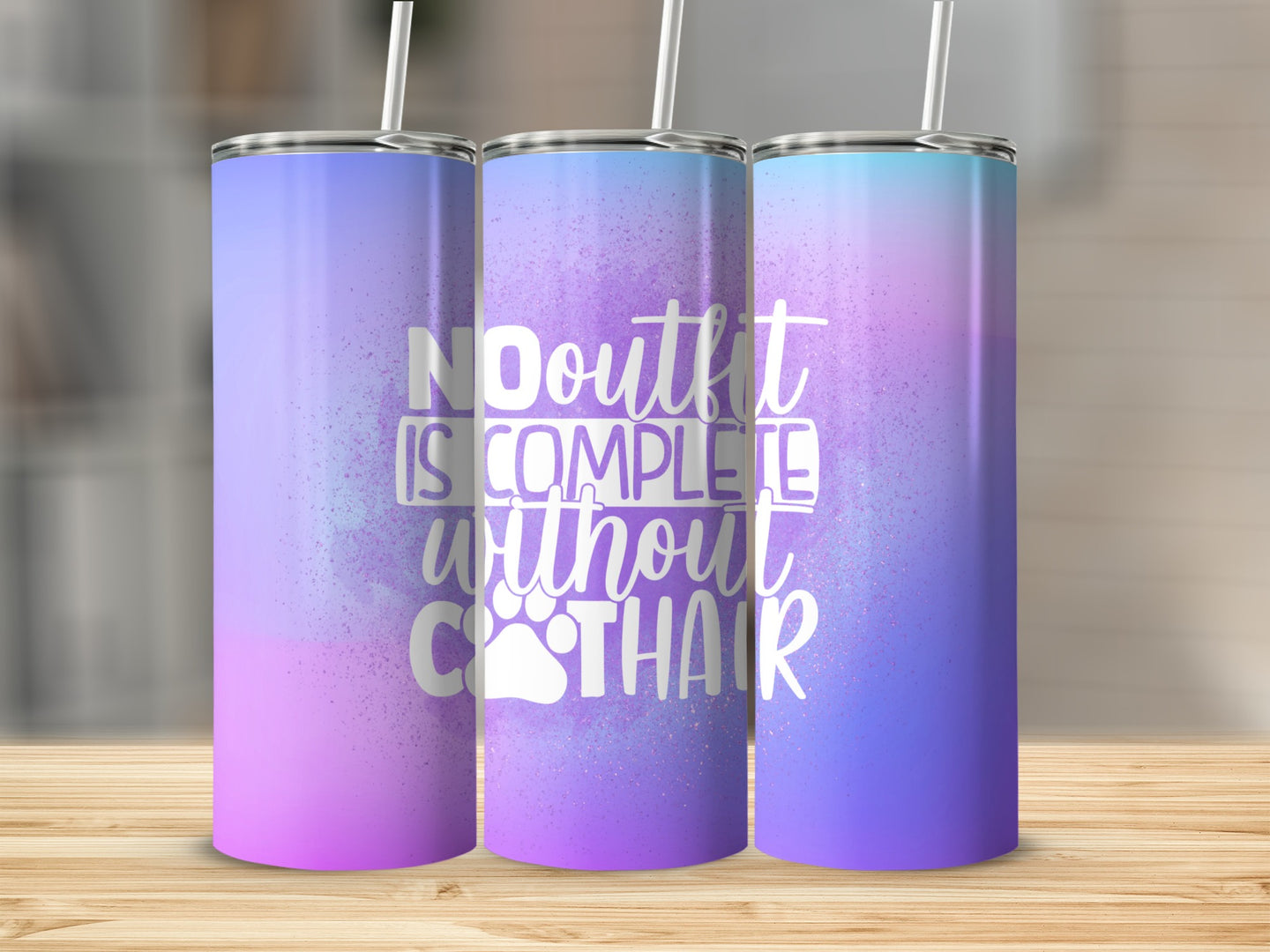 Three tall, slender tumblers with a gradient of purple and blue, featuring text.