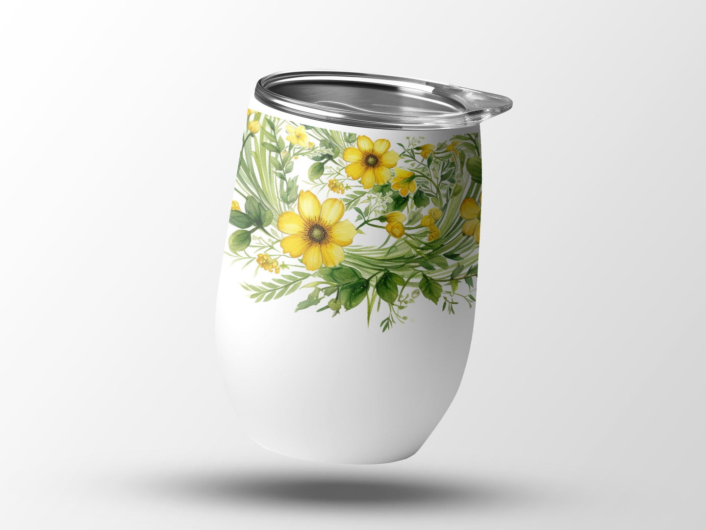 White tumbler with a vibrant yellow floral and green leaf design.