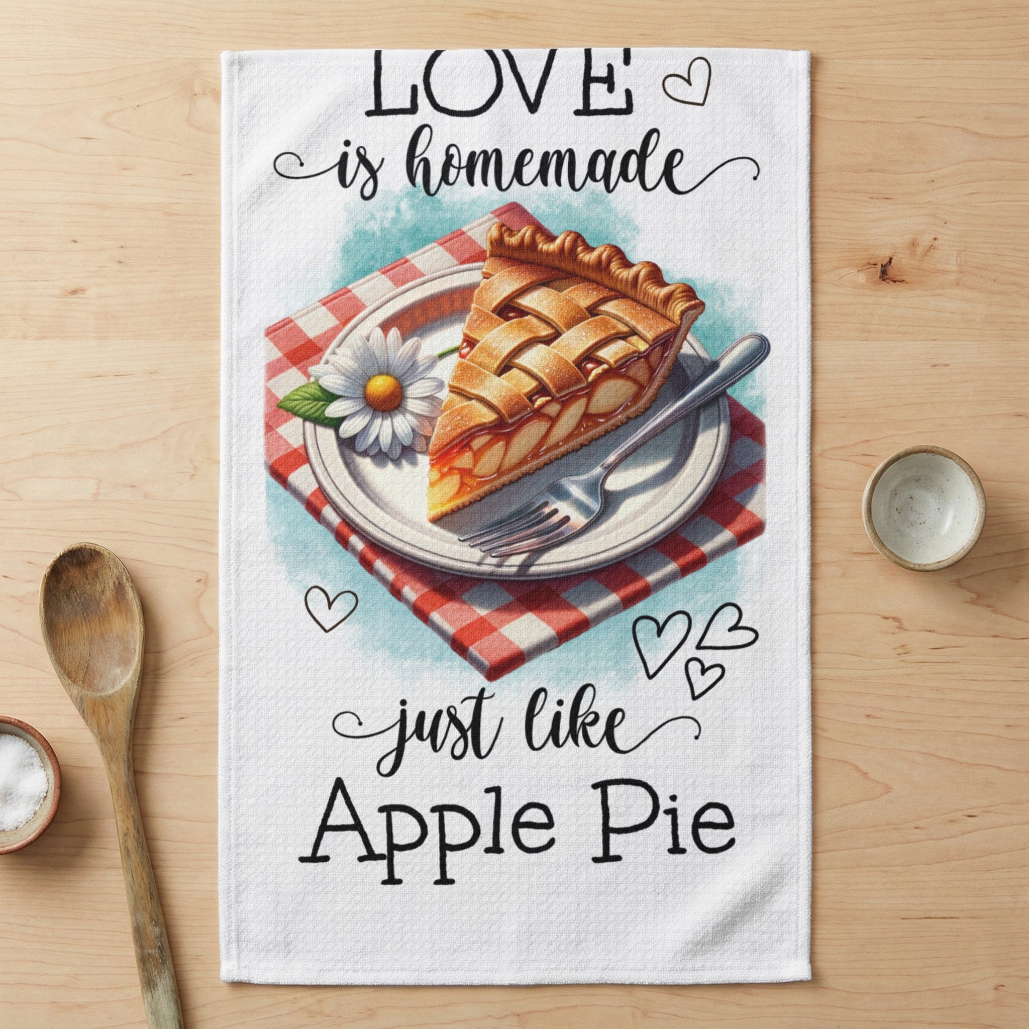 Towel with a slice of apple pie and text "LOVE is homemade just like Apple Pie".