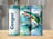 Tall tumbler with leaping bass, trees, and "Cooper" text.
