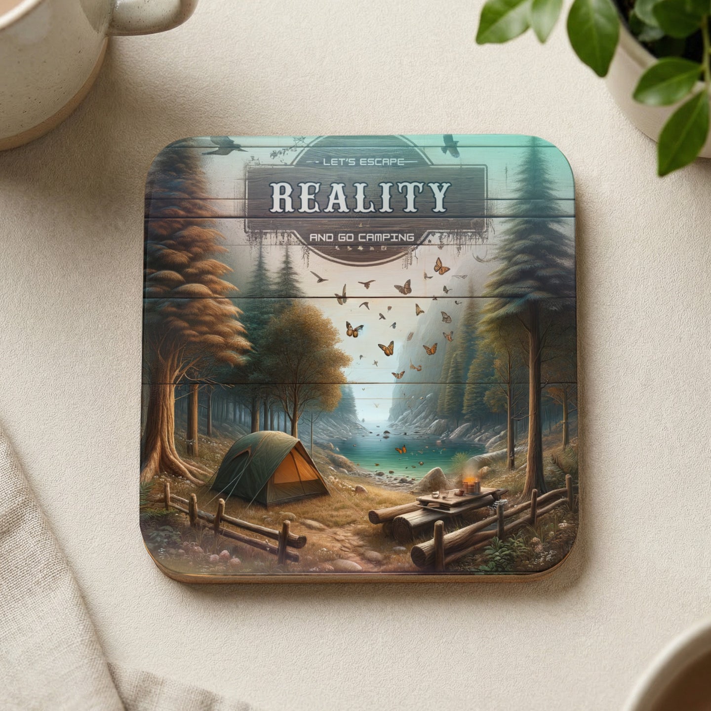 Wooden coaster featuring a forest camping scene with a tent and picnic table.