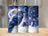 Dark blue tumbler with raven, moon, clouds, and dreamcatcher.