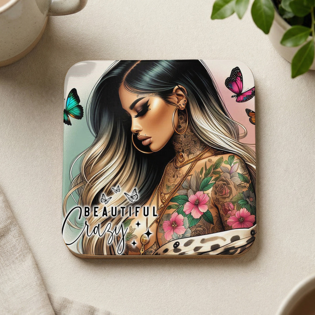 Coaster with tattooed woman, pink flowers, and butterflies, reads "BEAUTIFUL CRAZY".