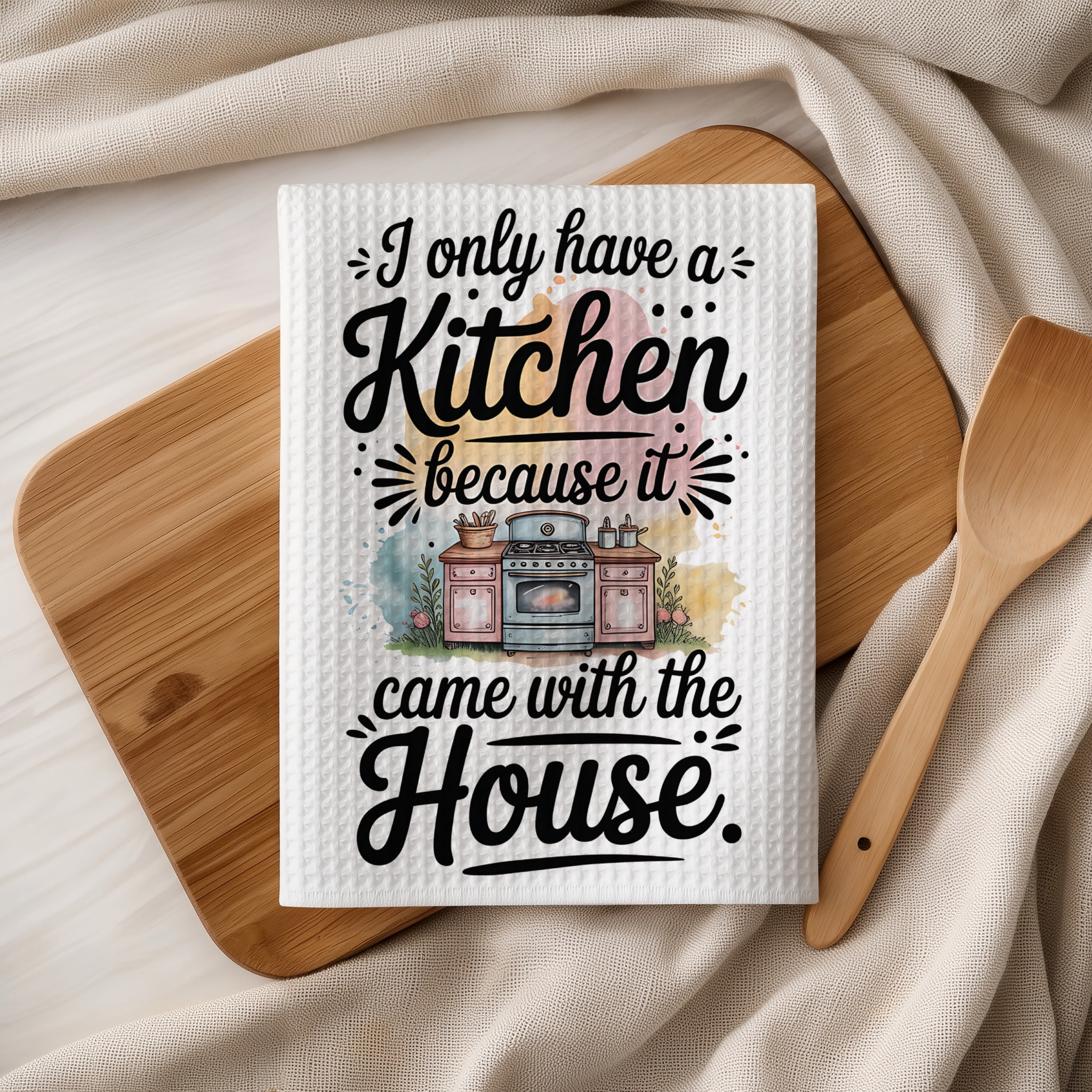 Kitchen towel with quote "I only have a kitchen because it came with the house."