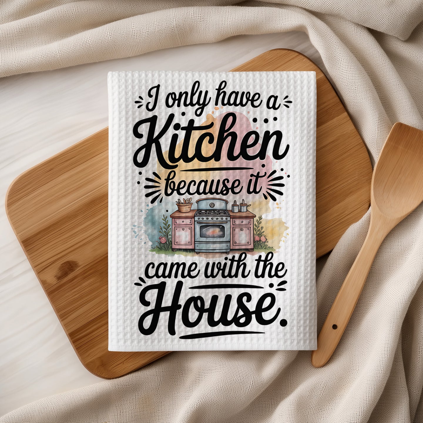 Kitchen towel with quote "I only have a kitchen because it came with the house."